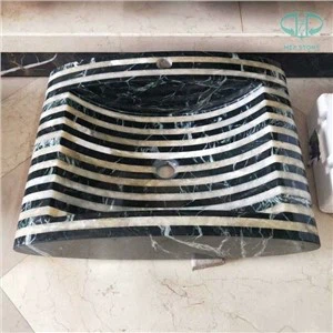 Pia de mármore preto e branco